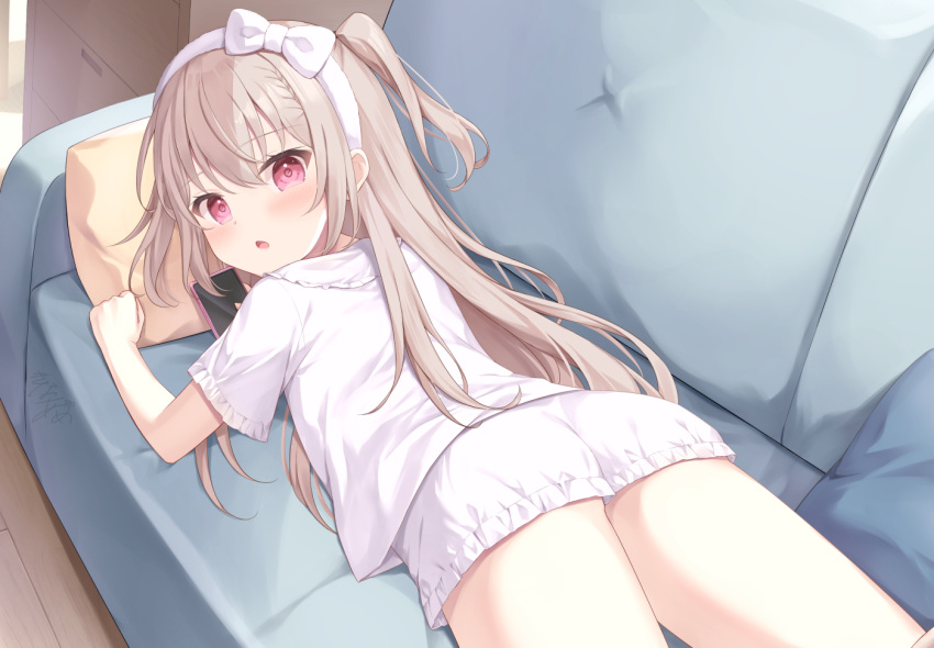 1girl, :o, brown_hair, cellphone, couch, groveling, hair_ornament, hair_over_shoulder