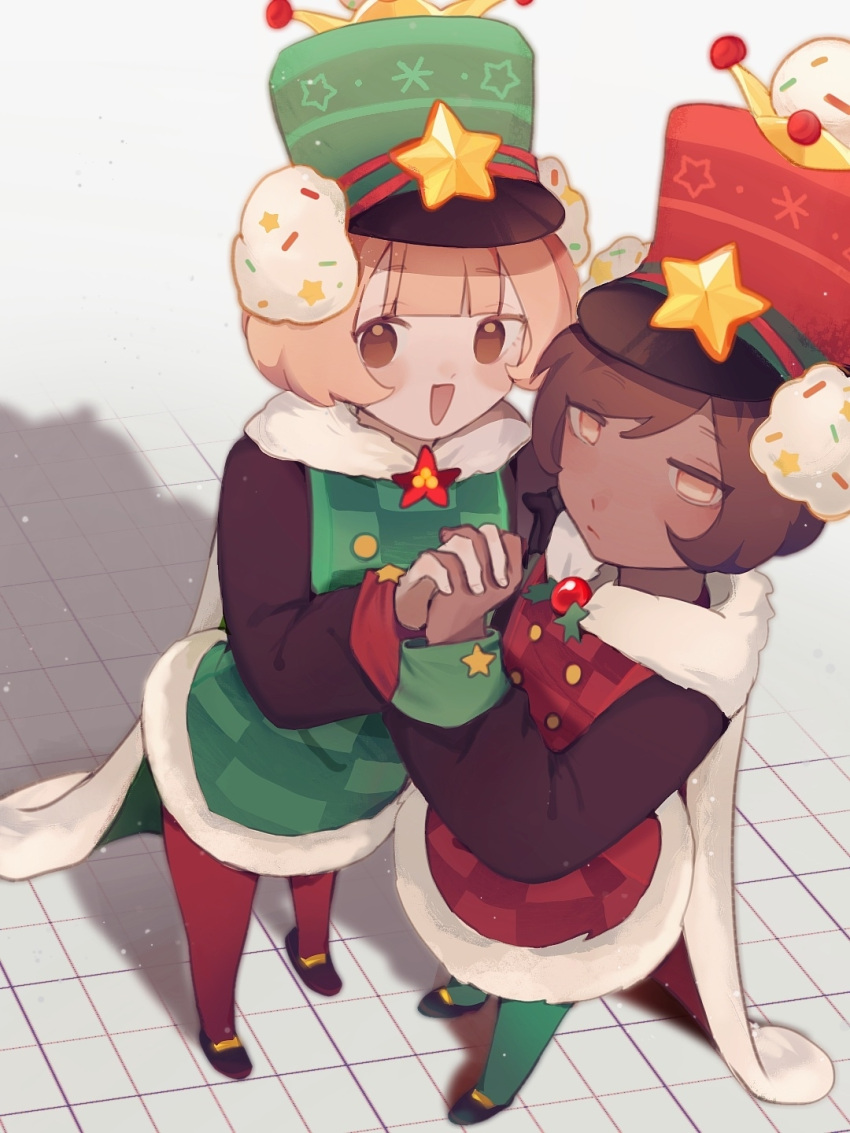 2girls, black_footwear, blonde_hair, blunt_bangs, bob_cut, brooch, brown_eyes, brown_hair, brown_sleeves, buttons, cape, checkered_clothes, checkered_dress, checkered_floor, christmas, closed_mouth, cookie_run, dark-skinned_female, dark_skin, dress, expressionless, foreshortening, from_above, fur-trimmed_cape, fur-trimmed_dress, fur_trim, green_dress, green_hat, green_leggings, half-closed_eyes, hands_up, happy, hat, hat_ornament, highres, holding_hands, humanization, interlocked_fingers, jewelry, jitome, leggings, light_particles, long_sleeves, looking_at_viewer, looking_to_the_side, multiple_girls, no_pupils, official_alternate_costume, open_mouth, pale_skin, pawn_black_cookie, pawn_black_cookie_(winter_guard), pawn_white_cookie, pawn_white_cookie_(winter_guard), red_dress, red_hat, red_leggings, shadow, shoes, sideways_glance, standing, star_(symbol), star_hat_ornament, yugege566