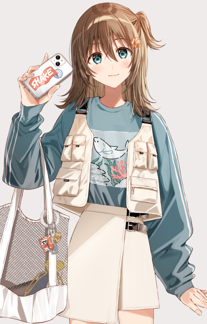 1girl, animal_print, bag, blue_eyes, blue_shirt, brown_hair, cellphone, charm_(object)