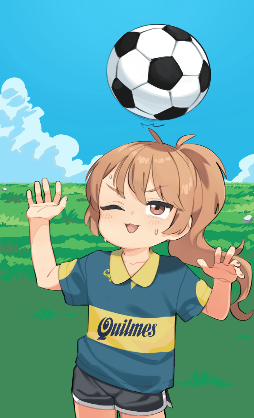 1girl, absurdres, ball, black_shorts, blue_sky, brown_eyes, brown_hair, collared_shirt, cowboy_shot, day, dolphin_shorts, grass, highres, looking_up, one_eye_closed, original, outdoors, ponytail, print_shirt, quilmes_(brand), raised_eyebrow, shirt, shorts, sky, soccer_ball, solo, sweatdrop, yokappa_(jokappa)