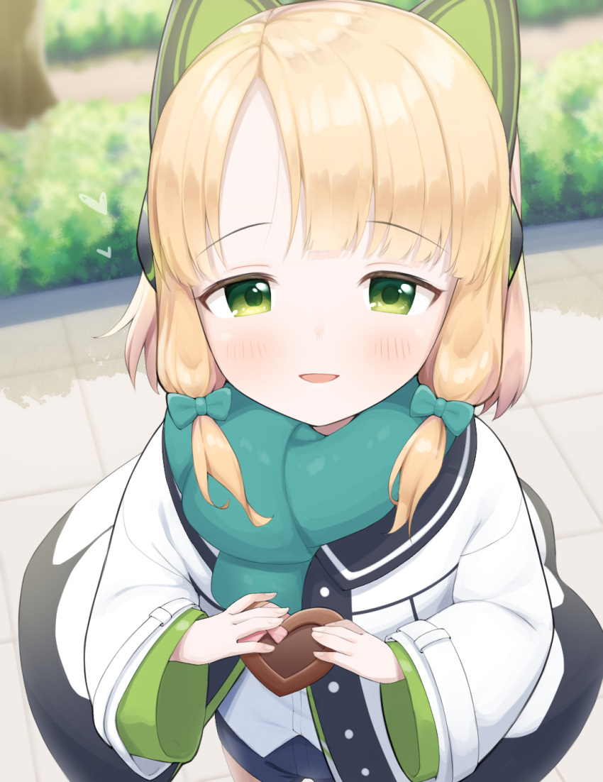 1girl, animal_ears, blonde_hair, blue_archive, bush, candy, cat_ears, cat_tail, chocolate, commentary_request, day, food, gift, green_eyes, green_scarf, heart, heart-shaped_chocolate, heart-shaped_food, highres, holding, holding_food, holding_gift, ikisugi_shokudou, jacket, light_blush, looking_at_viewer, midori_(blue_archive), multiple_tails, open_mouth, outdoors, scarf, smile, solo, standing, tail, textless_version, tree, valentine, white_jacket