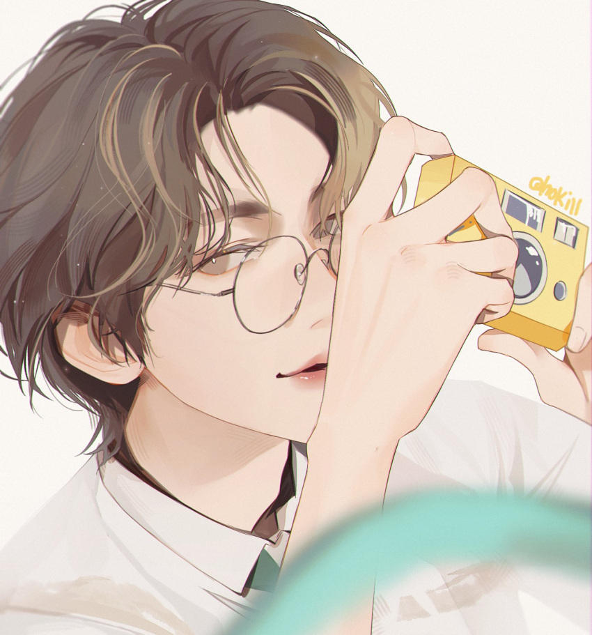 1boy, brown_eyes, brown_hair, camera, close-up, commentary, glasses, hashtag-only_commentary