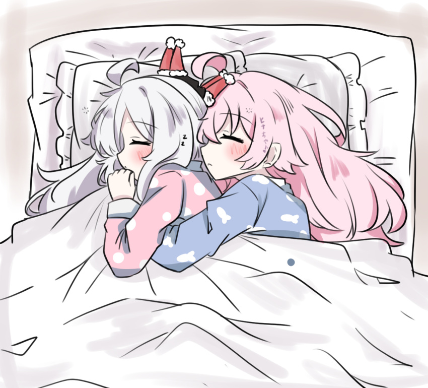 2girls, blue_archive, blue_shirt, blush, closed_eyes, closed_mouth, commentary_request, cuddling, e_v_e_neko, from_above, hat, hat_on_horn, hina_(blue_archive), horns, hoshino_(blue_archive), long_hair, long_sleeves, mini_hat, multiple_girls, pillow, pink_hair, pink_shirt, red_hat, shirt, squeans, under_covers, yuri, zzz