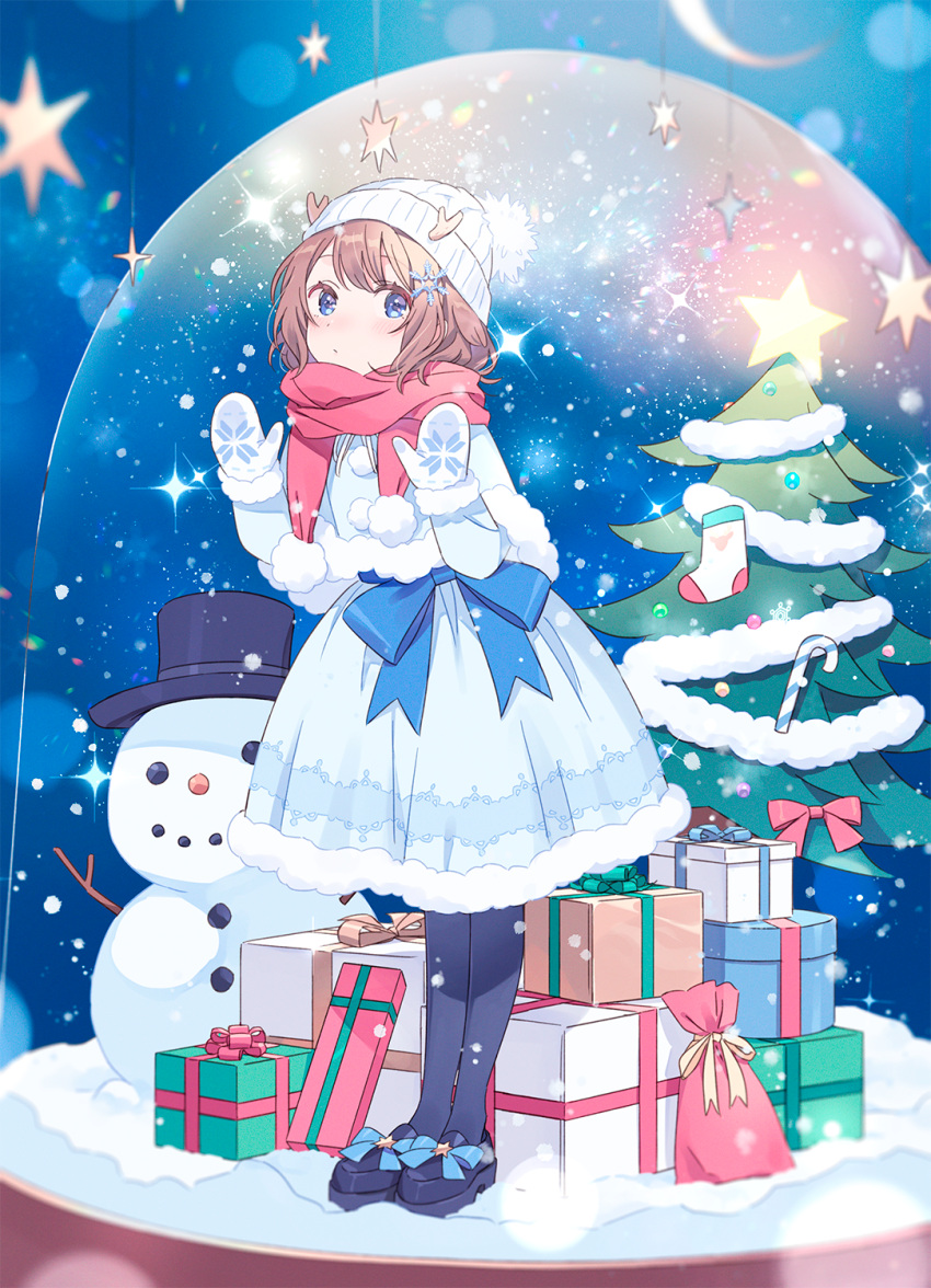 1girl, antlers, beanie, black_pantyhose, blue_dress, blue_eyes, blurry, blurry_background, blush, bow, brown_hair, christmas_tree, commentary, deer_antlers, dress, full_body, fur-trimmed_dress, fur_trim, gift, hair_ornament, hat, hechima_(issindotai), highres, horns, in_container, in_snow_globe, kano_(utaite), looking_at_viewer, mittens, pantyhose, pom_pom_(clothes), red_scarf, scarf, short_hair, snow_globe, snowflake_hair_ornament, snowing, snowman, solo, sparkle, virtual_youtuber, waist_bow, waist_ribbon, white_hat, white_mittens, winter_clothes