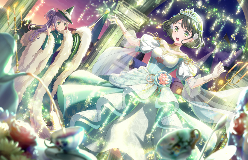 2girls, aqua_tiara, black_hair, breasts, closed_mouth, dress, dress_flower, dutch_angle, flower, fur-trimmed_shawl, fur_trim, game_cg, green_dress, green_eyes, green_hat, green_shawl, hair_bun, hair_flower, hair_ornament, hat, highres, holding, holding_wand, index_finger_raised, link!_like!_love_live!, long_hair, lotus, love_live!, magic, medium_breasts, momose_ginko, momose_ginko_(kiseki_no_butoukai_(104th)), multiple_girls, official_alternate_costume, official_alternate_hairstyle, official_art, open_mouth, otomune_kozue, otomune_kozue_(kiseki_no_butoukai_(104th)), outdoors, pantyhose, pink_flower, puffy_short_sleeves, puffy_sleeves, purple_hair, shawl, short_sleeves, side_ponytail, sidelocks, single_side_bun, smile, split_mouth, standing, surprised, third-party_source, tiara, virtual_youtuber, wand, white_dress, white_flower, white_pantyhose, witch_hat, wizard
