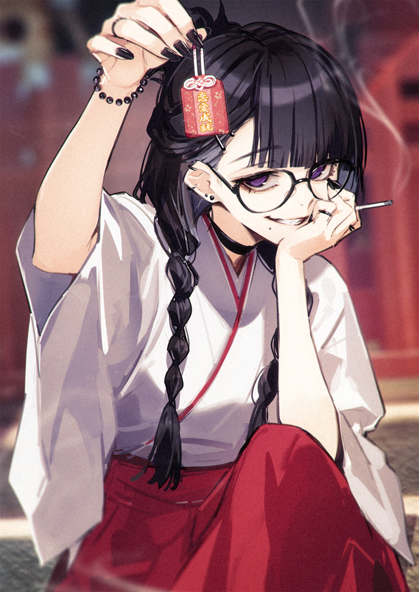 1girl, black_hair, black_nails, blurry, blurry_background, braid, choker, cigarette, commentary, ear_piercing, fuyuno_yuuki, glasses, grin, hakama, highres, holding, japanese_clothes, jewelry, long_hair, miko, mole, mole_under_mouth, nail_polish, omamori, original, piercing, ring, smile, solo, twin_braids, violet_eyes