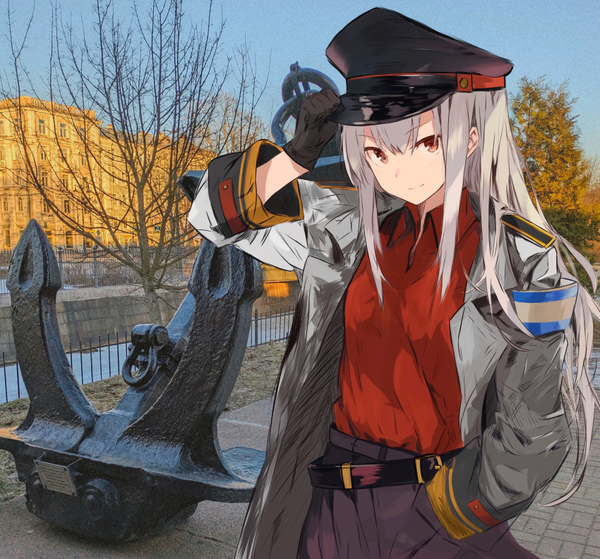 1girl, absurdres, adjusting_clothes, adjusting_headwear, anchor, armband, belt, black_belt, black_gloves, black_hat, closed_mouth, coat, commentary_request, gangut_(kancolle), gloves, hand_up, hat, highres, kantai_collection, koshka_pic, long_hair, long_sleeves, looking_at_viewer, open_clothes, open_coat, orange_eyes, pants, peaked_cap, photo_background, real_world_location, red_shirt, russia, saint_petersburg, shirt, shirt_tucked_in, shoulder_boards, smile, solo, upper_body, white_coat, white_hair