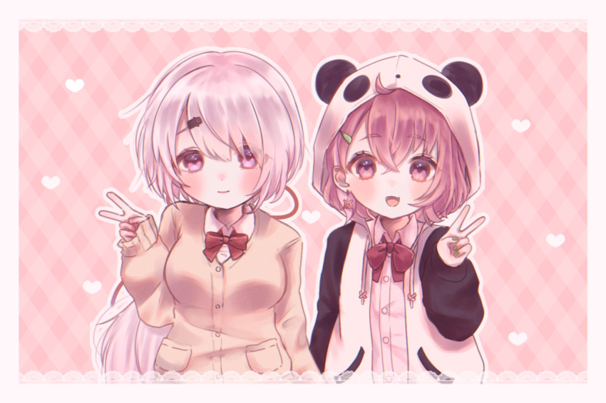 2girls, animal_hood, border, bow, brown_sweater, cropped_legs, drawstring, hair_ornament