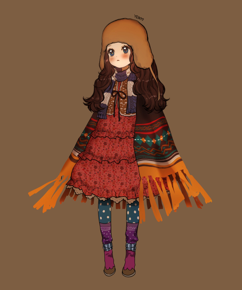 1girl, absurdres, artist_name, beanie, blue_eyes, blush, brown_background, brown_hair, cloak, closed_mouth, dress, earflap_beanie, floral_print, frilled_dress, frills, fringe_trim, full_body, hat, highres, long_hair, multicolored_leggings, original, patterned_clothing, petticoat, polka_dot, polka_dot_legwear, ribbon, scarf, socks, standing, striped_clothes, striped_scarf, striped_socks, vest, wavy_hair, white_petticoat, yerm