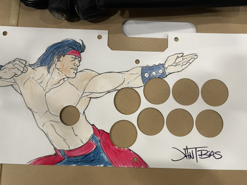 1boy, abs, arcade_stick, artist_name, black_hair, black_pants, black_wrist_cuffs, bracelet, controller, game_controller, headband, highres, jewelry, john_tobias, joystick, kung_fu, liu_kang, male_focus, mortal_kombat, mortal_kombat_(series), mortal_kombat_trilogy, muscular, pants, pectorals, photo_(medium), red_headband, red_pants, signature, sketch, solo, topless_male, traditional_media, two-tone_pants, wrist_cuffs