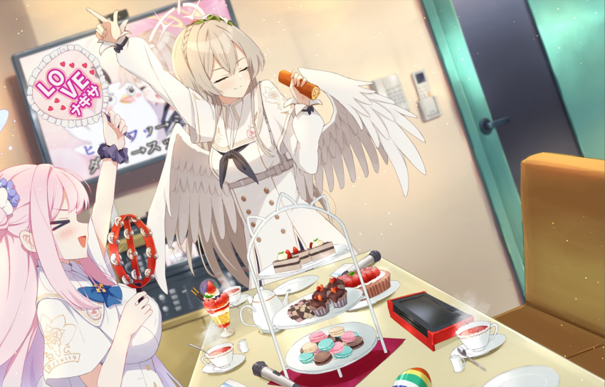>_<, 2girls, :d, arm_up, black_bow, black_neckerchief, black_scrunchie, blue_archive, blue_bow, blue_bowtie, blurry, blurry_background, blush, blush_stickers, bow, bowtie, braid, breasts, brown_hair, buttons, cake, cake_slice, capelet, character_name, character_print, closed_eyes, closed_mouth, commentary, cowboy_shot, crown_braid, cup, double-breasted, double-parted_bangs, dress, dutch_angle, english_text, facing_viewer, feathered_wings, flower, food, glint, hair_between_eyes, hair_bun, hair_flower, hair_ornament, halo, hand_fan, hand_up, happy, heart, heart_print, hifumi_(blue_archive), highres, holding, holding_fan, holding_food, holding_tambourine, holy-san_(makuu), index_finger_raised, indoors, instrument, karaoke, large_breasts, long_hair, long_sleeves, macaron, microphone, mika_(blue_archive), multiple_girls, nagisa_(blue_archive), neckerchief, open_mouth, parfait, peroro_(blue_archive), pink_flower, pink_halo, profile, puffy_long_sleeves, puffy_sleeves, purple_flower, school_uniform, scrunchie, sidelocks, single_side_bun, sleeve_bow, smile, split_mouth, steam, straight_hair, sweets, swiss_roll, table, tambourine, tea, teacup, translated, trinity_general_school_logo, v-shaped_eyebrows, variant_set, very_long_hair, white_capelet, white_dress, white_flower, white_wings, wings, wrist_scrunchie