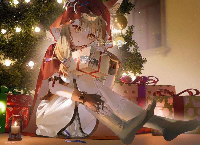 1girl, animal_ears, arknights, arknights:_endfield, artist_name, black_gloves, black_socks, blonde_hair, candle, christmas, christmas_present, christmas_tree, cloak, commentary_request, dress, endministrator_(arknights), extra_ears, female_endministrator_(arknights), fingerless_gloves, full_body, gift, gloves, highres, hood, hood_up, hooded_cloak, kneehighs, knees_up, long_hair, looking_at_viewer, male_endministrator_(arknights), no_shoes, orange_eyes, parted_lips, red_cloak, rossi_(arknights), sitting, socks, solo, white_dress, wolf_ears, wolf_girl, yellow_eyes, yukiusagi_(snowrabbit0508)