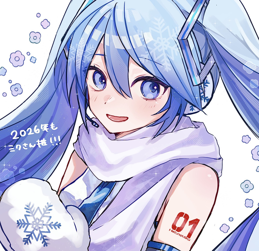 1girl, 2026, arm_tattoo, blue_eyes, blue_hair, blue_necktie, blue_trim, character_name, commentary_request, detached_sleeves, earmuffs, eyes_visible_through_hair, flower, hair_between_eyes, hair_ornament, hatsune_miku, highres, kunreishiki, long_hair, mittens, necktie, nekokan_(awao_o), open_mouth, print_mittens, romaji_text, scarf, shirt, simple_background, smile, snowflake_print, solo, tattoo, translation_request, twintails, upper_body, vocaloid, white_background, white_mittens, white_scarf, white_shirt, yuki_miku, yuki_miku_(2011)