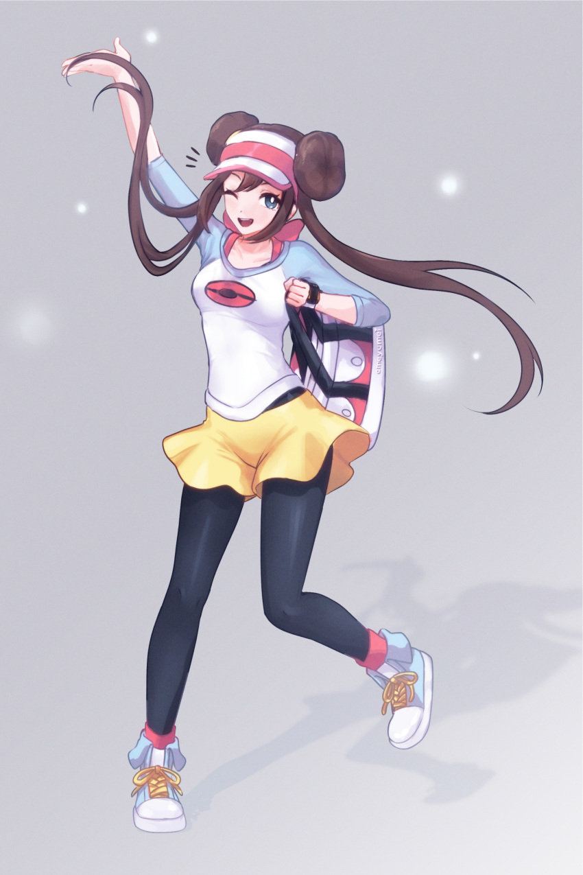 1girl, ;d, ameyumei, arm_up, black_pantyhose, blue_eyes, blue_shoes, bright_pupils, brown_hair, commentary, double_bun, eyelashes, full_body, grey_background, hair_bun, happy, highres, holding_strap, long_hair, notice_lines, one_eye_closed, open_mouth, pantyhose, pink_socks, pokemon, pokemon_bw2, raglan_sleeves, rosa_(pokemon), shirt, shoes, shorts, smile, socks, solo, teeth, twintails, untranslatable_commentary, upper_teeth_only, visor_cap, white_pupils, yellow_shorts