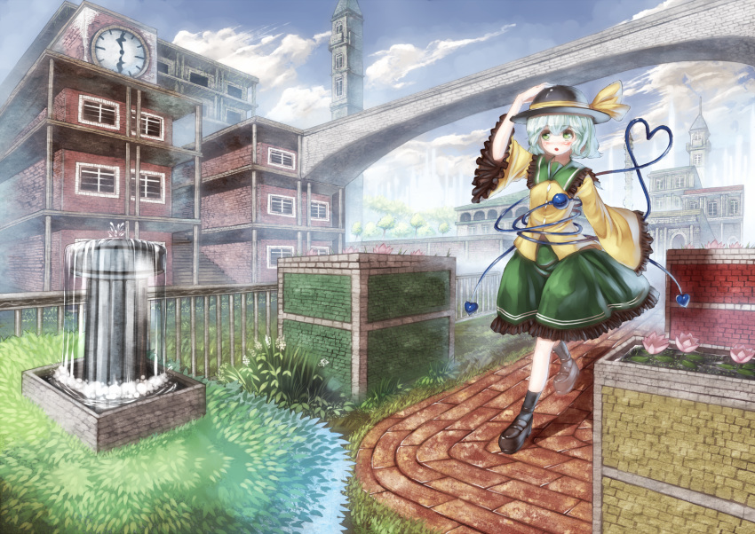 1girl, blush, bridge, building, city, clock, eyeball, fountain, green_eyes, green_hair, green_skirt, hand_on_hat, hat, heart, heart_of_string, highres, homeless_mk_ii, komeiji_koishi, open_mouth, scenery, short_hair, skirt, solo, third_eye, touhou, walking