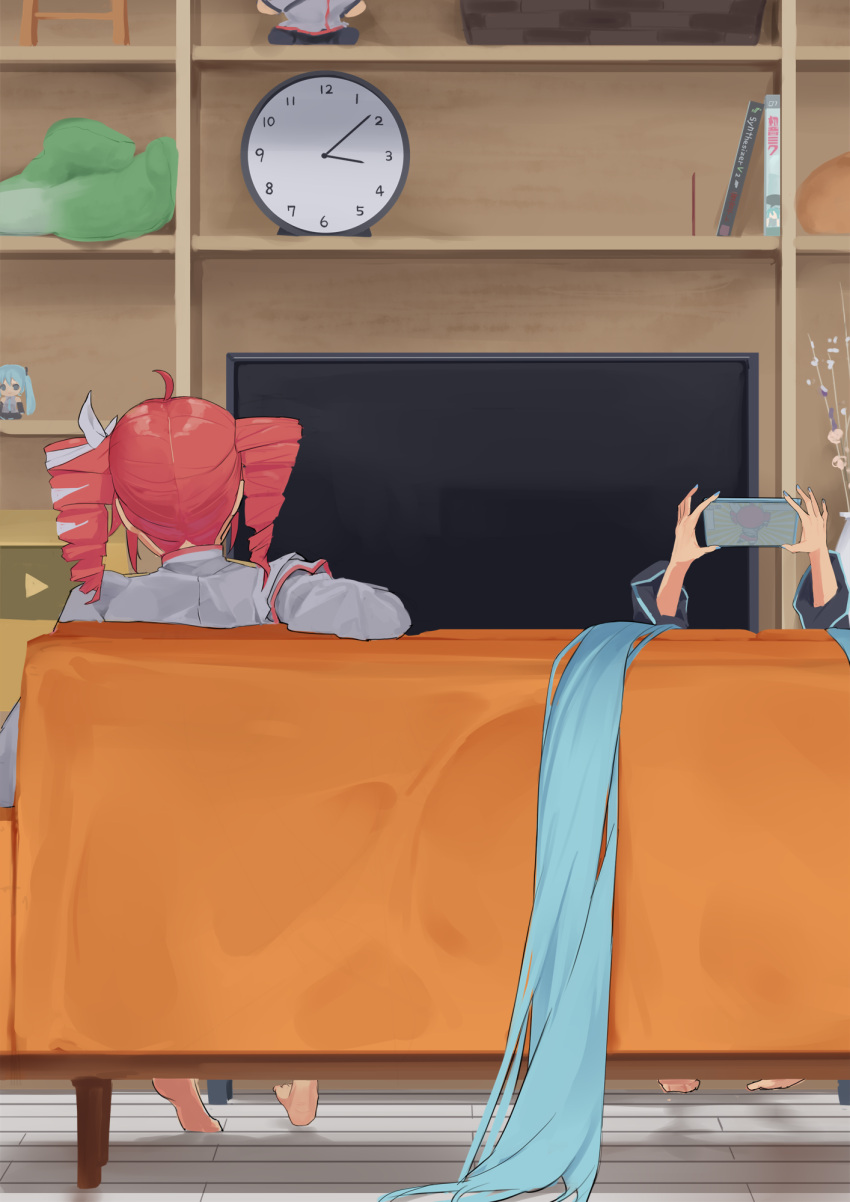 2girls, ahoge, aqua_hair, barefoot, cellphone, character_doll, chibigurumi, clock, commentary_request, couch, doll, drill_hair, feet, from_behind, gold_creator_award, hatsune_miku, highres, holding, holding_phone, indoors, kasane_teto, long_hair, multiple_girls, on_couch, phone, pocche-ex, red_hair, sitting, slice_of_life, smartphone, television, twin_drills, twintails, very_long_hair, vocaloid, youtube_creator_award