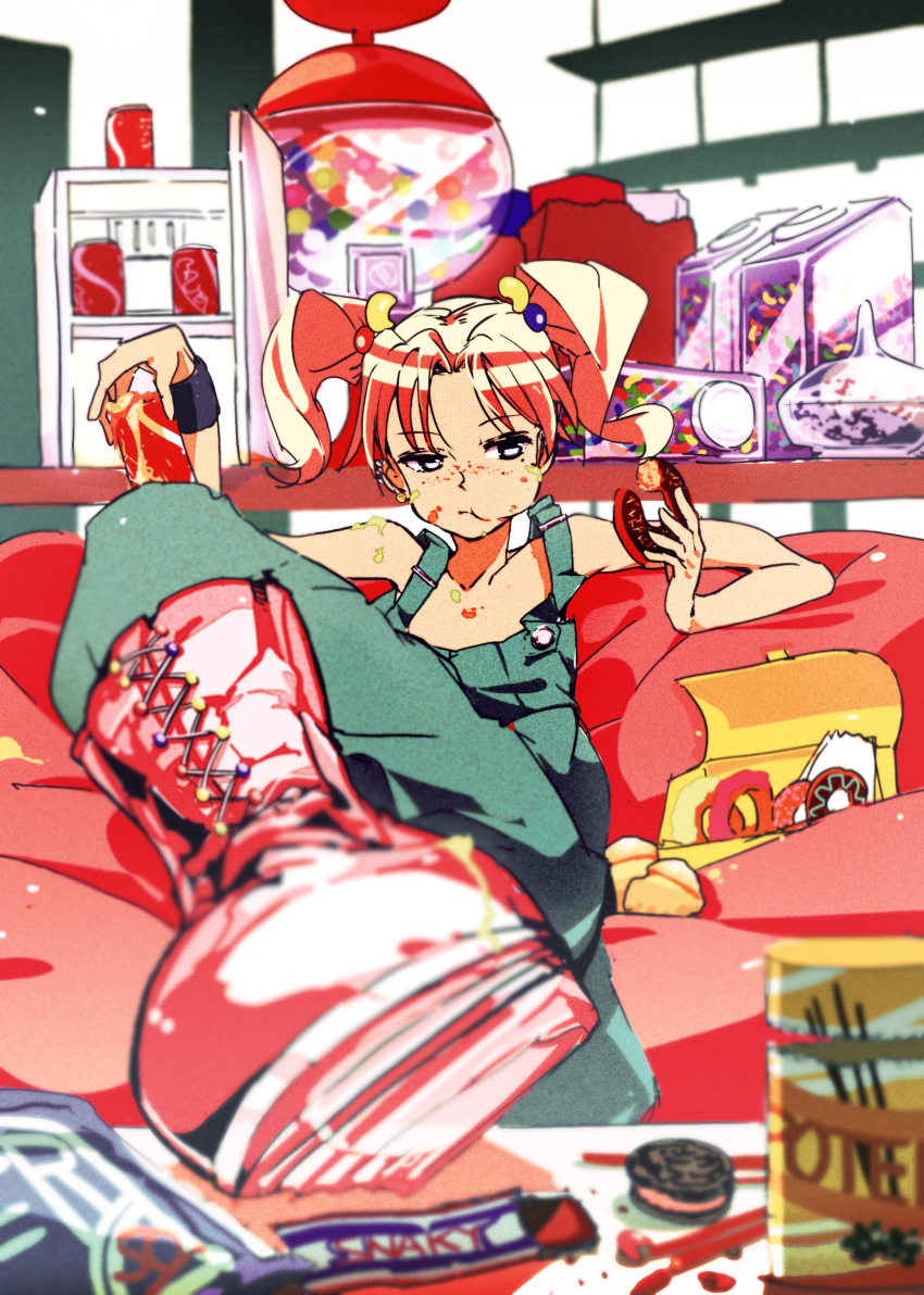 bean_bag, blurry, boots, brand_name_imitation, candy, chocolate, cookie, depth_of_field
