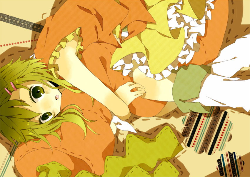 green_eyes, green_hair, gumi, hair_ornament, hairclip, motineko, open_mouth, pillow