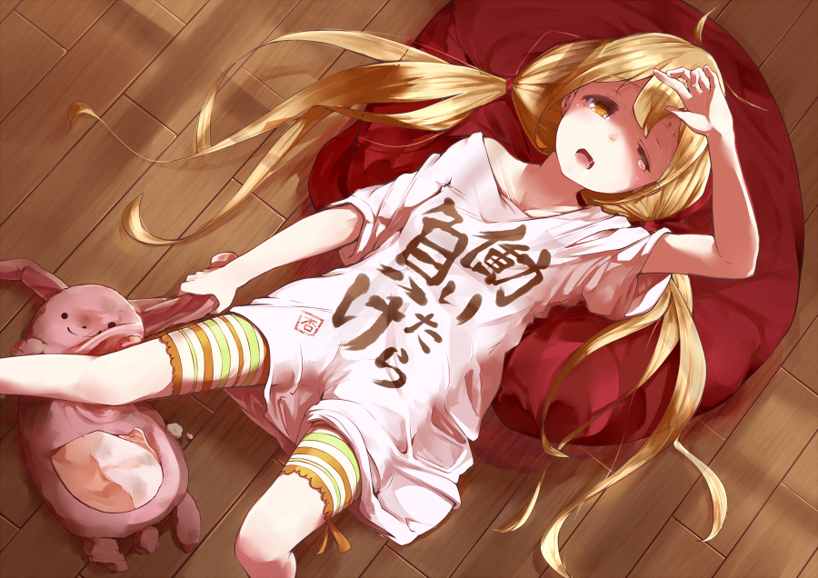 aiya, blonde_hair, clothes_writing, futaba_anzu, idolmaster, idolmaster_cinderella_girls, long_hair, lying
