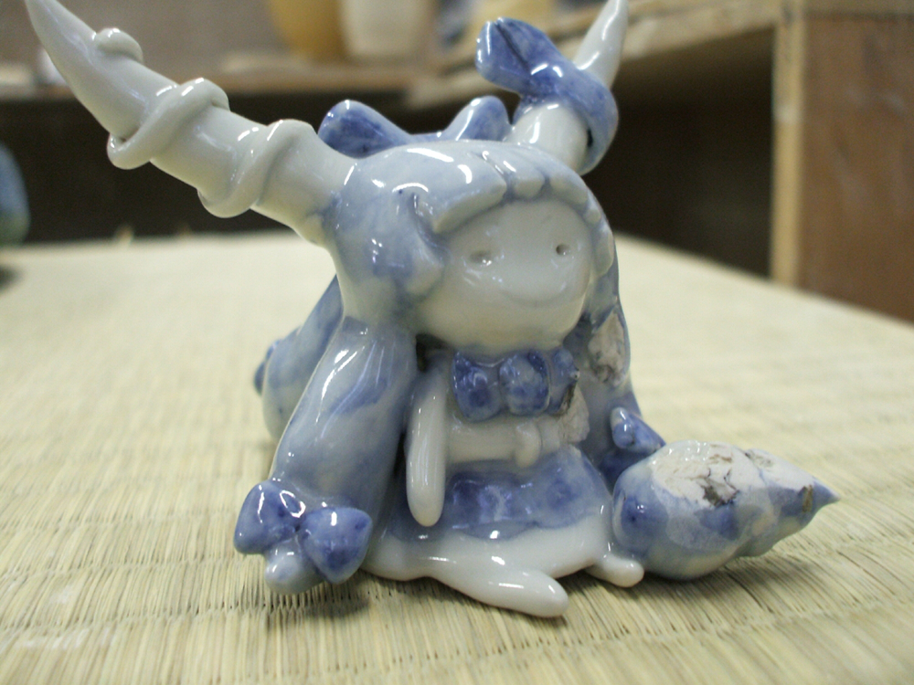 gourd, horn_ribbon, horns, ibuki_suika, inu_poteto, photo, porcelain_(medium), ribbon